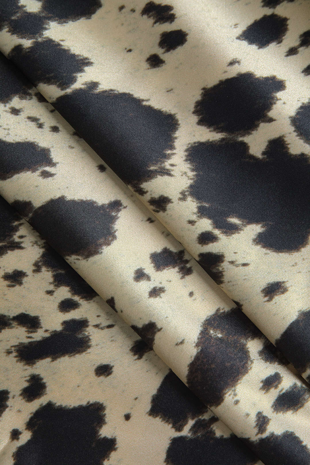 Damen Midirock Satin Kuhfellmuster Hochtailliert