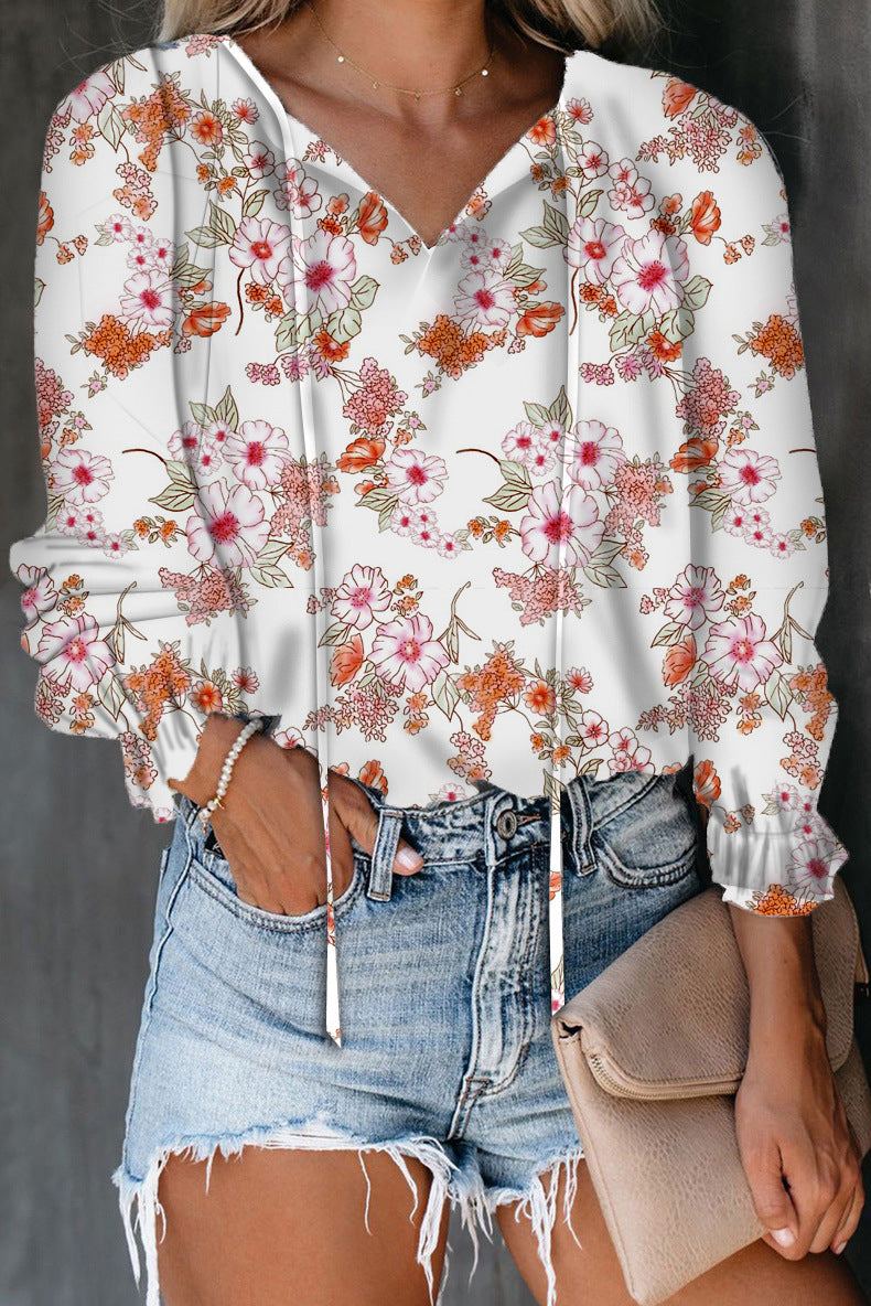 Damen Bluse mit Tierdruck Ärmel und Fransen Modern