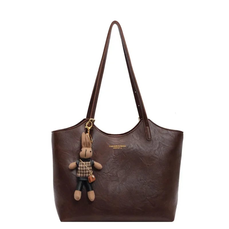 Dunkelbraune Tote Bag mit abnehmbarem Hasenanhänger