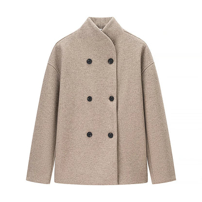 beige oversized double breasted damenjacke mit schwarzen knöpfen
