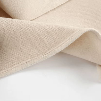 Stoffdetail Dalara Mantel, weiche Struktur
