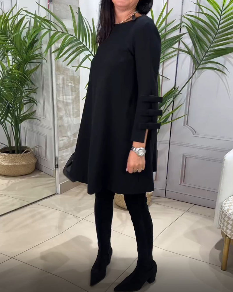 Elegantes Damenkleid mit Fransen-Details an den Ärmeln